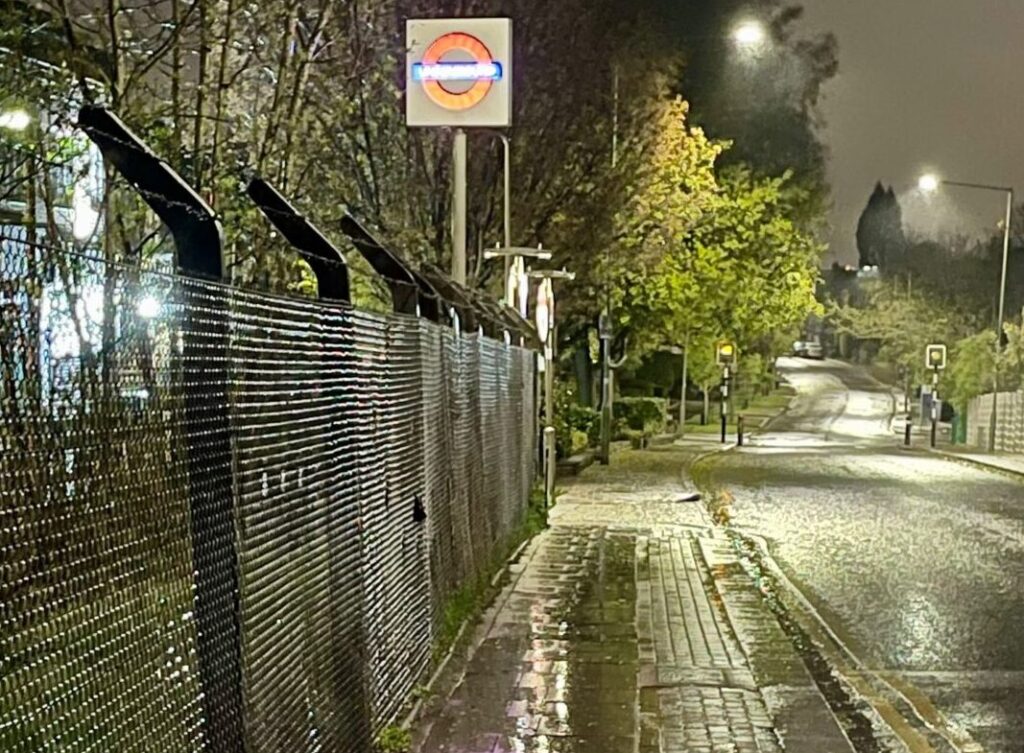 The road outside West Finchley Tube station in north London on a rainy night